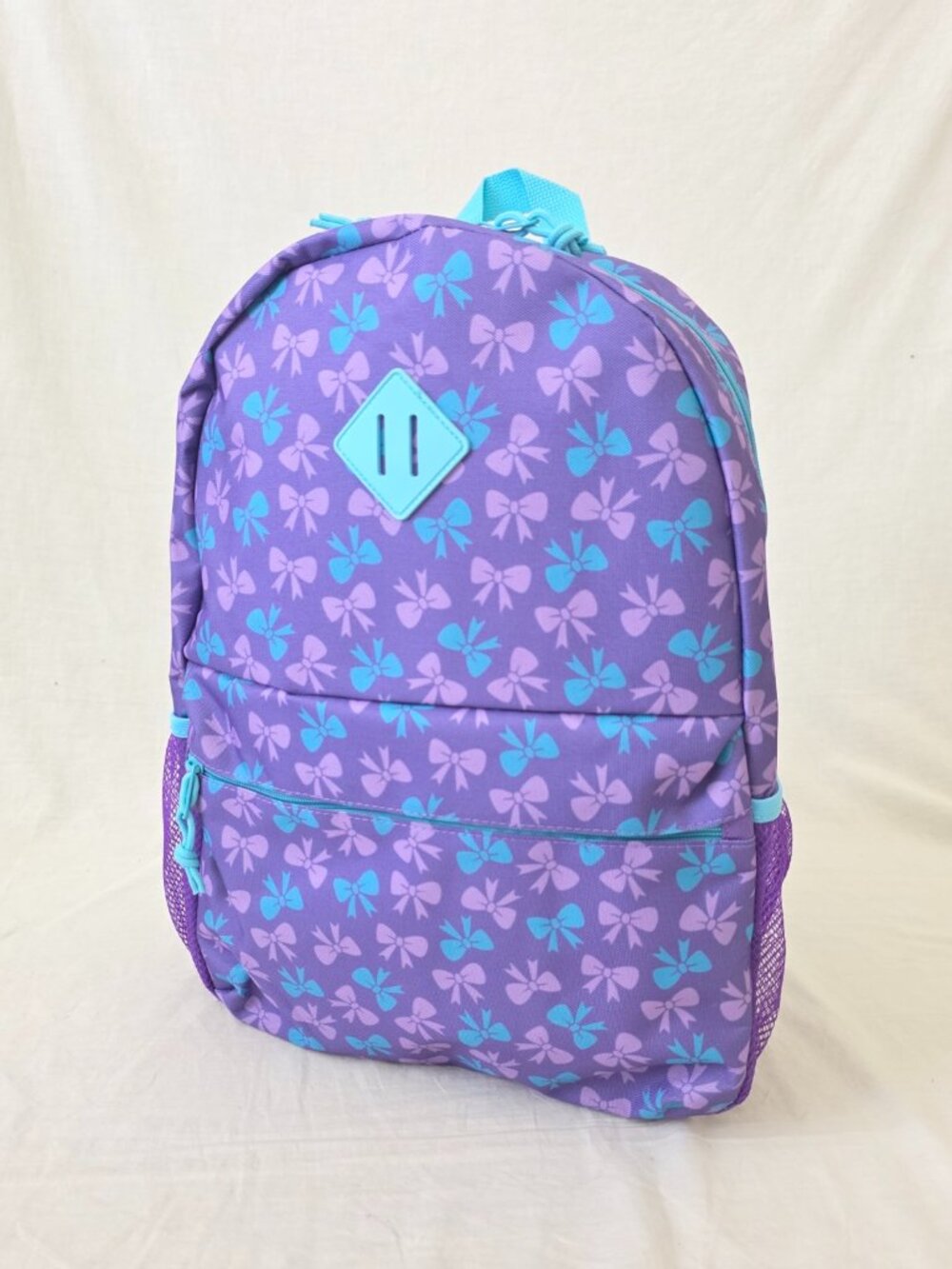 NWOT! Lightweight Purple/Turquoise Backpack w/Tied Bow Design & Bottle Pockets